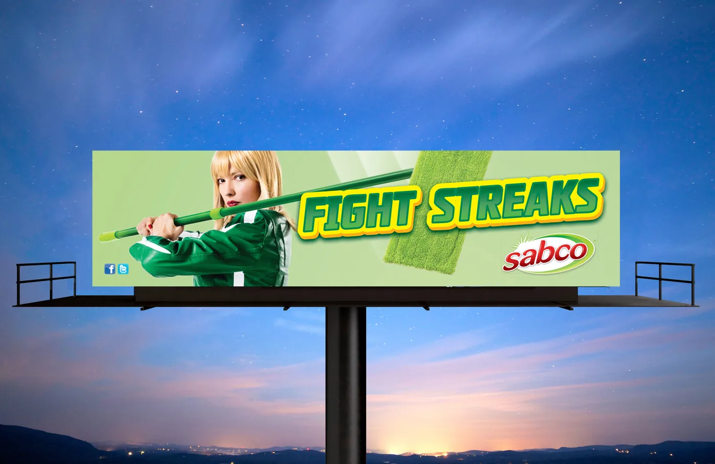 A Sabco billboard at dusk showing a child with a cleaning stick and the words “Fight Streaks”.
